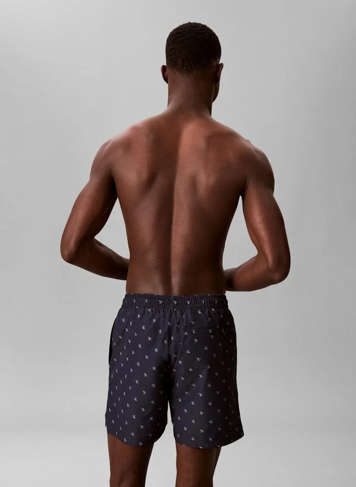 CALVIN KLEIN  Solid Swim Shorts for Men | Best Price UAE
